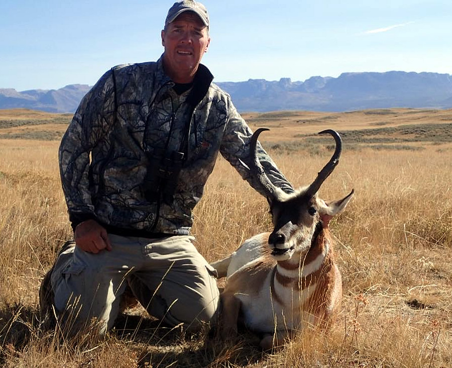 Hunter with Shiras Moose in Wind River Mountains of Wyoming